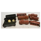 1305	LIONEL MODEL TRAIN LOT INCLUDES TRAIN CARS & CABOOSES 