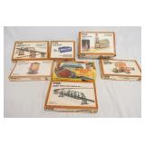 1322	7 TYCO MODEL BUILDING KITS, ONE IS SEALED IN BOX