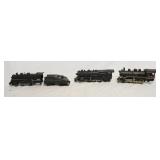 1329	MODEL TRAIN LOT INCLUDES 3 LOCOMOTIVES & ONE LIONEL TENDER. ONE LOCOMOTIVE IS MARKED LIONEL