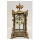 1066	ANSONIA VICTORIAN BRASS & GLASS CLOCK, HAS OPEN ESCAPEMENT, JEWELED FACE & PENDULUM, GLASS IS B