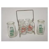1088	6 MINIATURE MILK BOTTLES, GREEN VALLEY FARMS & PURE MILD W/CARRIER, LARGEST IS 2 1/4 IN HIGH