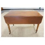 1144	ANTIQUE MAHOGANY DROP LEAF TABLE W/ONE DRAWER, ONE CASTOR WHEEL MISSING FROM FERRULE, 42 IN X 2