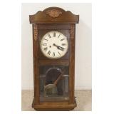 1204	WALL CLOCK W/APPLIED FORAL CARVINGS, 13 1/2 IN WIDE X 30 1/2 IN HIGH
