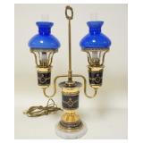 1214	PORCELAIN STUDENT STYLE LAMP W/CASED BLUE GLASS SHADES