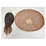 1232	AFRICAN WOODEN MASK & WOVEN BASKET, TEETH ON MASK ARE METAL, BASKET IS 14 1/4 IN DIAMETER