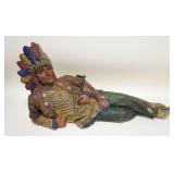 1234	PLASTER FIGURE OF A RECLING NATIVE AMERICAN, 24 IN LONG X 12 IN HIGH