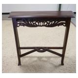 1279	TABLE W/FRETWORK SKIRT & STRETCHER BASE, 39 3/4 IN WIDE X 29 3/4 IN HIGH X 10 IN DEEP