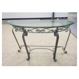1289	IRON BASE GLASS TOP DEMILUNE, TOP IS BEVELED, 50 1/4 IN WIDE X 18 IN DEEP X 28 IN HIGH