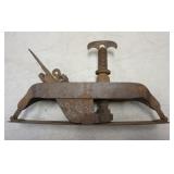 1317	ANTIQUE WOOD WORKING UNUSUAL COMPASS PLANE WITH THUMB SCREW ADJUSTMENT