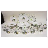 1334	28 PIECE JOHN DEERE DINNERWARE SET, DINNER PLATES ARE 11 3/8 IN