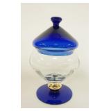 1006	COVERED FOOTED COMPOTE COBALT BASE W/ GOLD RIM & RIBBED CLEAR GLASS CENTER APP. 9 IN H 