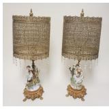 1012	FIGURAL TABLE LAMPS W/ UNUSUAL PIERCED METAL SHADES & BRASS BASE THAT IS FOOTED W/ CHERUBS APP.