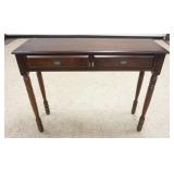 1033	NARROW WALNUT FINISH TWO DRAWER HALL TABLE. APP.  42 IN W X 13 IN DEEP X 34 IN H 