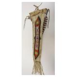 1057	VINTAGE NATIVE AMERICAN BEADED QUIVER, W/ARROW W/STONE ARROWHEAD, APPROXIMATELY 28 IN LONG