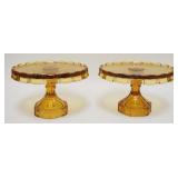 1084	2 AMBER FOSTORIA COIN GLASS CAKE STANDS. 7 1/4 IN H 