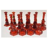 1087	15 RUBY RED FOSTORIA COIN GLASS CANDLE STICKS, TWO SIZES. TALLEST 8 IN H 