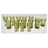 1111	LOT OF OLIVE GREEN FOSTORIA COIN GLASSES. LOT INCLUDES FIVE GOBLETS, SEVEN DRINKING GLASSES & T