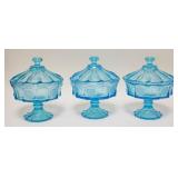 1118	3 BLUE FOSTORIA COIN GLASS COVERED COMPOTES APP. 10 IN H 