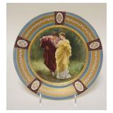 1163	ROYAL VIENNA HAND PAINTED PLATE, HAS A FAINT LINE IN THE BASE, 9 5/8 IN
