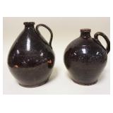 1167	2 EARLY OVOID REDWARE JUGS, SMALLER HAS RIM & BASE CHIPS, LARGER IS 10 1/2 IN & HAS MINOR BASE 