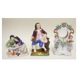 1182	3 ANTIQUE PORCELAIN FIGURES, BOY & GIRL READING, GIRL HAS A BROKEN FINGER, CLOCK CASE & SEATED 