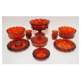 1288	9 PIECE RED FOSTORIA COIN, 8 3/4 IN COMPOTE, 2-7 3/4 IN BOWLS, 3 ASHTRAYS, 2 CIGARETTE HOLDERS 