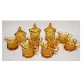 1291	10 PIECE AMBER FOSTORIA COIN, 6 CREAMERS & 3 COVERED SUGARS