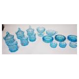 1296	14 PIECE FOSTORIA LIGHT BLUE, 3 COVERED SUGARS, 3 CREAMERS, 6 ASH TRAYS & A NAPPIE