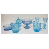 1297	7 PIECES FOSTORIA 2 SHADES OF LIGHT BLUE, 2 PITCHERS, 2 VASES, OVAL BOWL, LARGE COMPOTE & SMALL
