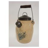 1002	BLUE DECORATED STONEWARE BATTER JUG W/TIN LID & SPOUT COVER, APPROXIMATELY 11 IN HIGH