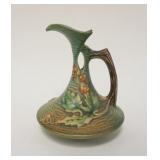 1019	ROSEVILLE GREEN BUSHBERRY EWER, TWIG HANDLED, APPROXIMATELY 6 1/2 IN HIGH