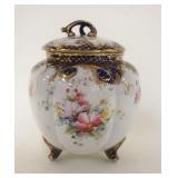 1054	CHINA FOOTED & RIBBED BISQUIT JAR W/HAND PAINTED FLOWERS, APPROXIMATELY 8 IN HIGH
