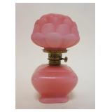 1057	MINIATURE KEROSENE LAMP W/PINK SATIN GLASS SHAPE, APPROXIMATELY 7 IN HIGH