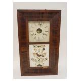 1059	ANSONIA WEIGHT DRIVEN OGEE SHELF CLOCK, SOME VENEER LOSS TO CASE, REVERSE PAINTED LOWER GLASS D