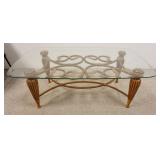 1107	ORNATE GLASS TOP COFFEE TABLE W/METAL VINE LIKE SCROLL & TAPERED FLUTTED LEGS, APPROXIMATELY 51