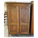 1115	COUNTRY FRENCH CARVED OAK WARDROBE, DOUBLE DOOR W/ADJUSTABLE INTERIOR SHELVING, APPROXIMATELY 5