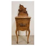 1126	FANCY CARVED SMOKING STAND W/INSET BROWN MARBLE TOP, SCALLOPED EDGE, CARVED DOUBLE SHELF BACK B