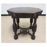 1216	ANTIQUE CARVED ENGLISH OAK OCTAGONAL TABLE W/INLAY ON TOP, LOSSES TO TOP EDGE, APPROXIMATELY 29