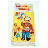 1266	VINTAGE BATTERY OPERATED TOY BALLOON VENDOR, 1961 JAPAN, APPROXIMATELY 11 IN HIGH