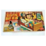 1267	VINTAGED BATTERY OPERATED TOY SLEEPING BABY BEAR, CORRODED BATTERY COMPARTMENT