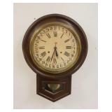 1009	ANTIQUE WALNUT SPRING WOUND CALLENDAR CLOCK, APPROXIMATELY 17 1/2 IN X 24 IN HIGH