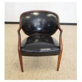 1041	BLACK LEATHER & WALNUT FRAME ARMCHAIR