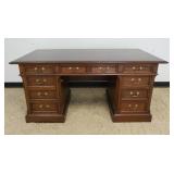 1059	HEKMAN OFFICE DESK, 8 DRAWER, MAHOGANY W/FILE DRAWER, APPROXIMATELY 66 IN X 34 IN X 30 1/4 IN H