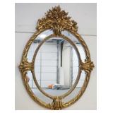 1086	LARGE ORNATE OVAL CAROLINA MIRROR IN COMPOSITE FRAME W/GILT FINISH, APPROXIMATELY 42 IN X 56 IN