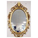 1114	ORNATE SYROCO OVAL MIRROR IN COMPOSITE FRAME, APPROXIMATELY 37 IN X 21 IN