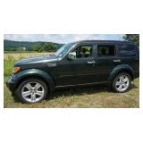 1171	2010 GREEN DODGE NITRO 4 X4 VIN 1DPU7EX6AWI6362