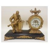 1179	NEW HAVEN VICTORIAN CAST METAL FIGURAL SHELF CLOCK. APP. 7 IN X 20 I X 16 IN H 