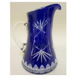 1191	COBALT CUT TO CLEAR WATER PITCHER W/ POLISHED BASE APP. 9 IN H 