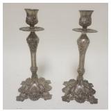 1216	PAIR OF ORNATE SILVERPLATE CANDLESTICKS. APP. 12 IN H 