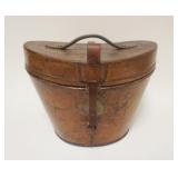 1269	ANTIQUE LEATHER HAT BOX W/ TOP HAT. APP 11 IN HIGH A.J. WHITE HATTER & CAPMAKER 74863 JERMYN ST